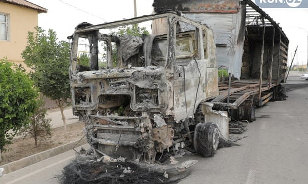 A burned truck amid protests in Nukus, the capital of the northwestern Karakalpakstan region in Uzbekistan.