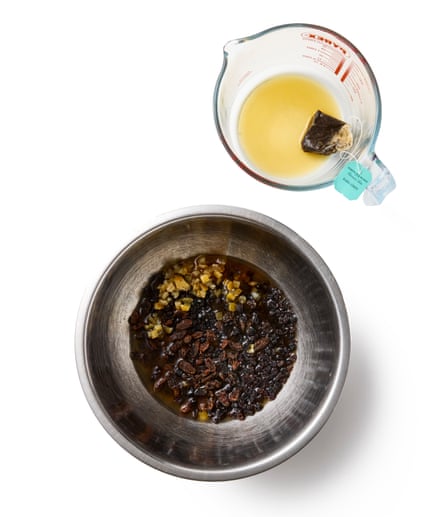 the dried fruit and peel in a heatproof bowl and hot tea.