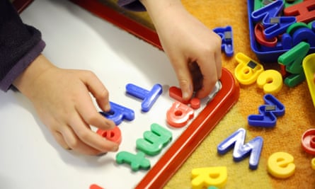 A child using alphabet tools