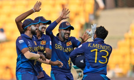 Sri Lanka’s captain Kusal Mendis celebrates the run out of England’s Adil Rashid with his teammates.