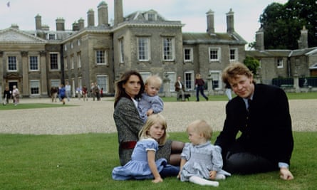 With his first wife, Victoria and daughters Kitty, Eliza and Katya, outside Althorp House, Northamptonshire.