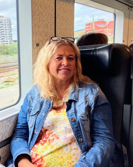 Helen Sjögren in a train carriage