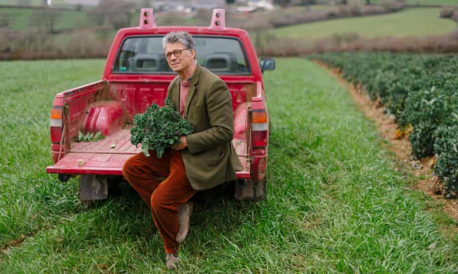 Guy Singh-Watson with his crop of purple sprouting broccoli in Devon.