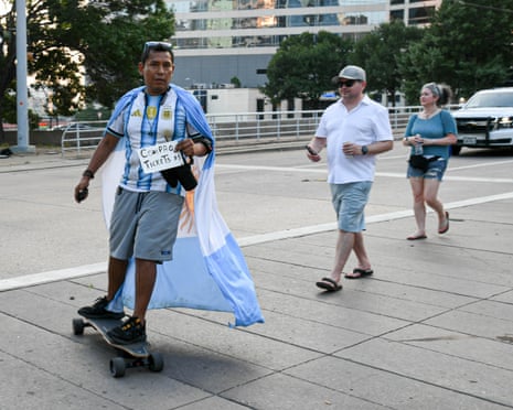 An Argentine fan on a skateboard.