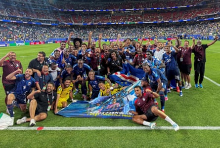 Cape Verde players and staff celebrate in the Houston Stadium, Texas, after qualifying for the knockout stages of the World Cup.