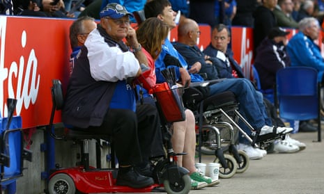 Disabled Leicester City fans watch the Premier League match against Burnley.