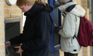 Students at York University using a cash machine
