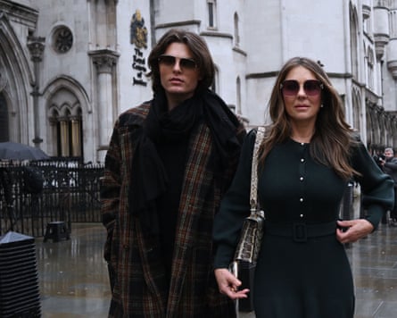 Elizabeth Hurley and her son, Damian, outside the Royal Courts of Justice