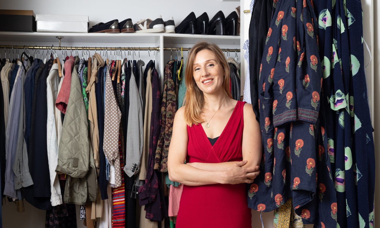 Morwenna Ferrier with her wardrobe full of secondhand clothes