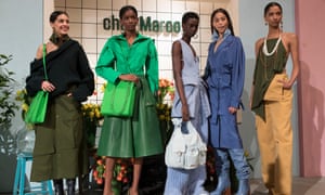 Jacquemus models wearing leather culottes, utilitarian waistcoats and belted coats