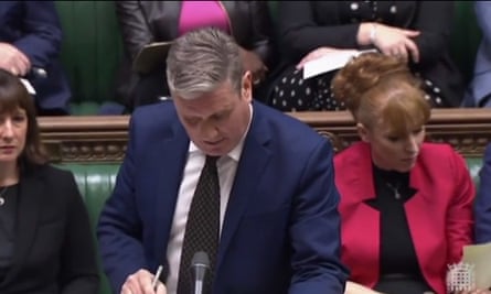 Angela Rayner reads a note about queen’s ill health in Commons