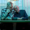 Andy and Vince sat side by side, Vince's head is resting on Andy's shoulder