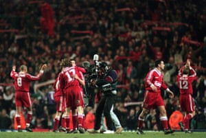 Liverpool players acknowledge the support of the Kop after a thrilling victory over Newcastle.