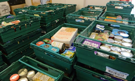 Boxes piled up in a food bank for distribution to people in need.