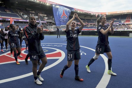 Marie Laure Delie, Veronica Boquete and Irene Paredes of Paris Saint-Germain salute supporters after the Women’s Champions League match against Barcelona on 29 April 2017.