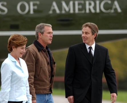 President Bush and first lady Laura Bush greet British Prime Minister Tony Blair on his arrival at the Bush ranch in Crawford, Texas, Saturday, April 5, 2002.