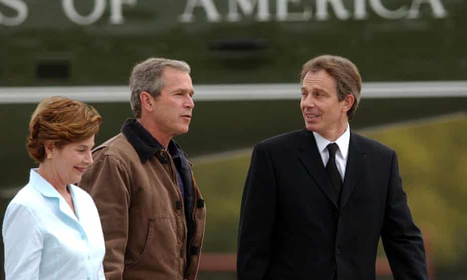 President Bush and first lady Laura Bush greet Tony Blair on his arrival at the Bush ranch in 2002