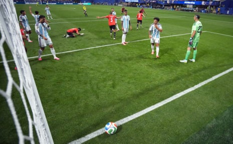Argentina players react after Egypt's Yasser Ibrahim scores their first goal.