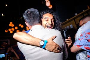 Two people hug