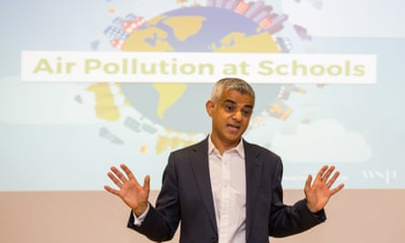 Sadiq Khan in front of air pollution in schools poster