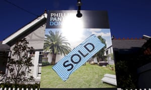 House with sold sign in Sydney.