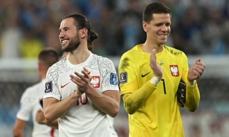 Poland's Grzegorz Krychowiak and goalkeeper Wojciech Szczesny express their relief