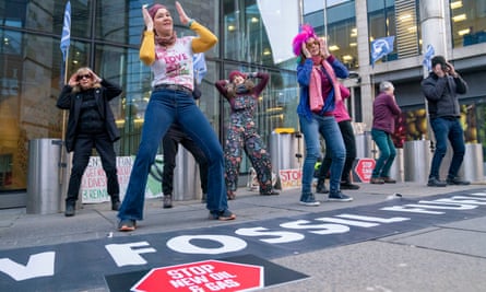 Extinction Rebellion activists protest outside the Pensions and Lifetime Savings Association conference in Edinburgh this year.