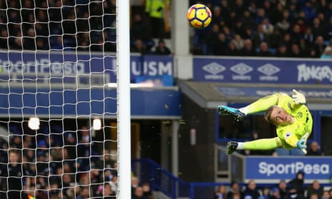 Goalkeeper Jordan Pickford of Everton looks back as he watches Juan Mata’s shot hit the post.