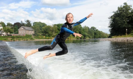 Jumping off the weir on the Usk at Crickhowell.
