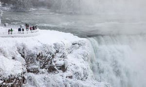 People visit the Niagara Falls during extreme cold weather as sub-zero temperatures are expected across Canada and the United States on New Year’s day.