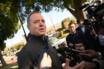 a man speaks to reporters