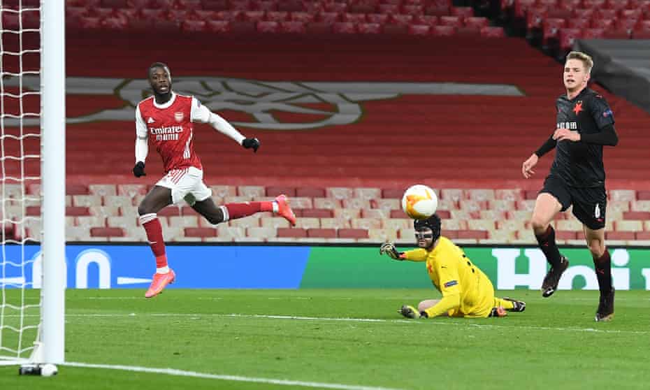 Nicolas Pépé chips the ball over Slavia Prague goalkeeper Ondrej Kolar to eventually open the scoring.