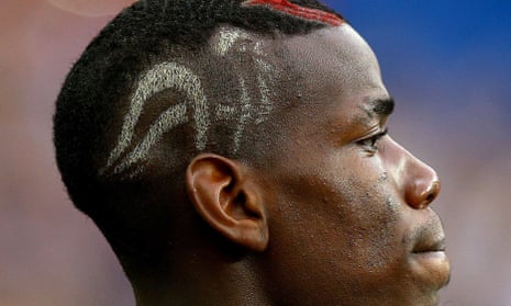 Paul Pogba displays the Gallic cockerel shaved into his head for the Euros.