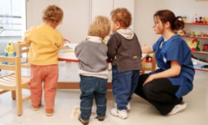 Childcare workers with kids at childcare centre