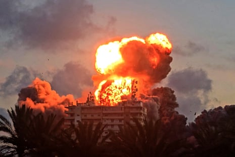 A fireball erupts from a building following an Israeli strike in Tyre.