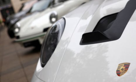Cars of German manufacturer Porsche parked outside the stock exchange in Frankfurt, Germany