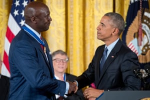 President Barack Obama presents the Presidential Medal of Freedom to Michael Jordan at the White House in 2016.