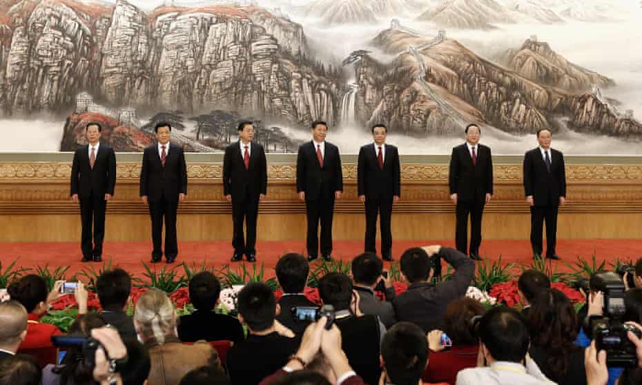 The all-male politburo standing committee greet the media in November 2012 in Beijing, China.