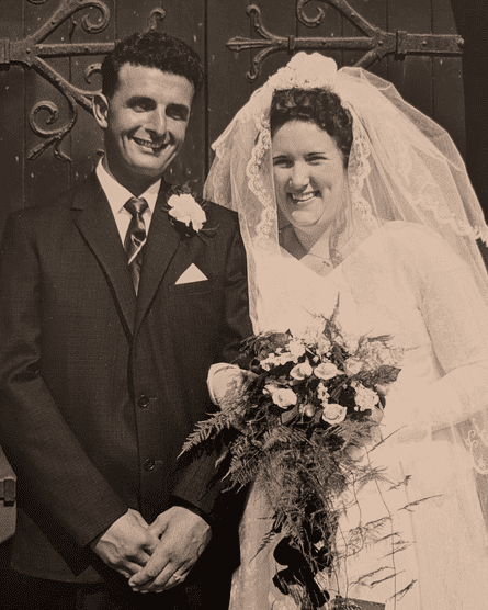 A black and white wedding photo of a bride and groom.