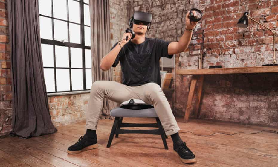 A VR gamer using the VRGO Mini.