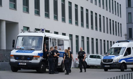 Police stand outside Charité hospital in Berlin, where Alexei Navalny is being treated.