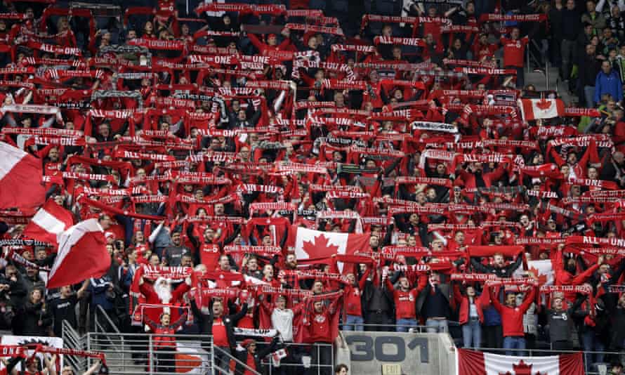 Toronto FC fans cheer Sunday, Nov. 10, 2019, at the MLS Cup championship soccer match between the Seattle Sounders and Toronto FC in Seattle. (AP Photo/Elaine Thompson)