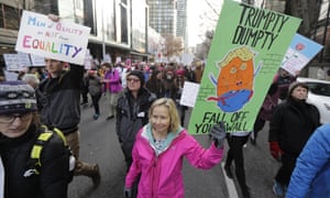 A participant in the Seattle Women’s March carries a sign that reads “Trumpty Dumpty Fall Off Your Wall” Saturday, Jan. 19, 2019 in downtown Seattle. Cities big and small across the Pacific Northwest held versions or multiple versions of the Women’s March over the weekend, mirroring a national march in Washington, DC. (AP Photo/Ted S. Warren)