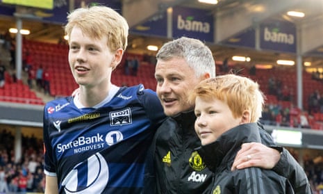 Manchester United manager Ole Gunnar Solskjær poses with his sons Noah (left) and Elijah. 