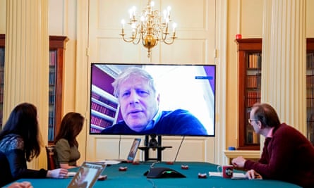 Boris Johnson chairing a coronavirus meeting by videolink on 28 March while he was in isolation.