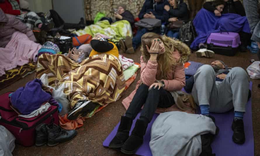 People spend the night in a Kyiv metro station.