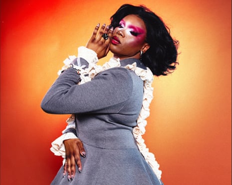 a person with their hand on their face