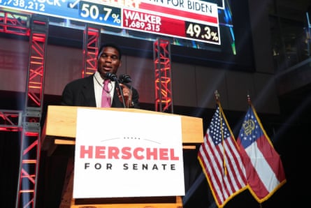 walker behind podium