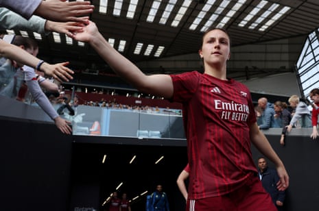 Arsenal’s Lotte Wubben-Moy presses the flesh while walking out to warm up ahead of her side’s WSL match against Aston Villa at VIlla Park.