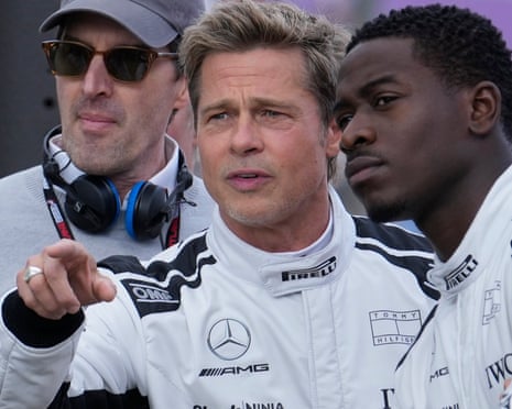 Brad Pitt and Damson Idris.